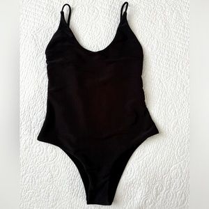 Stretchy black ribbed swimsuit from L.A. Hearts by PacSun. Very good condition.